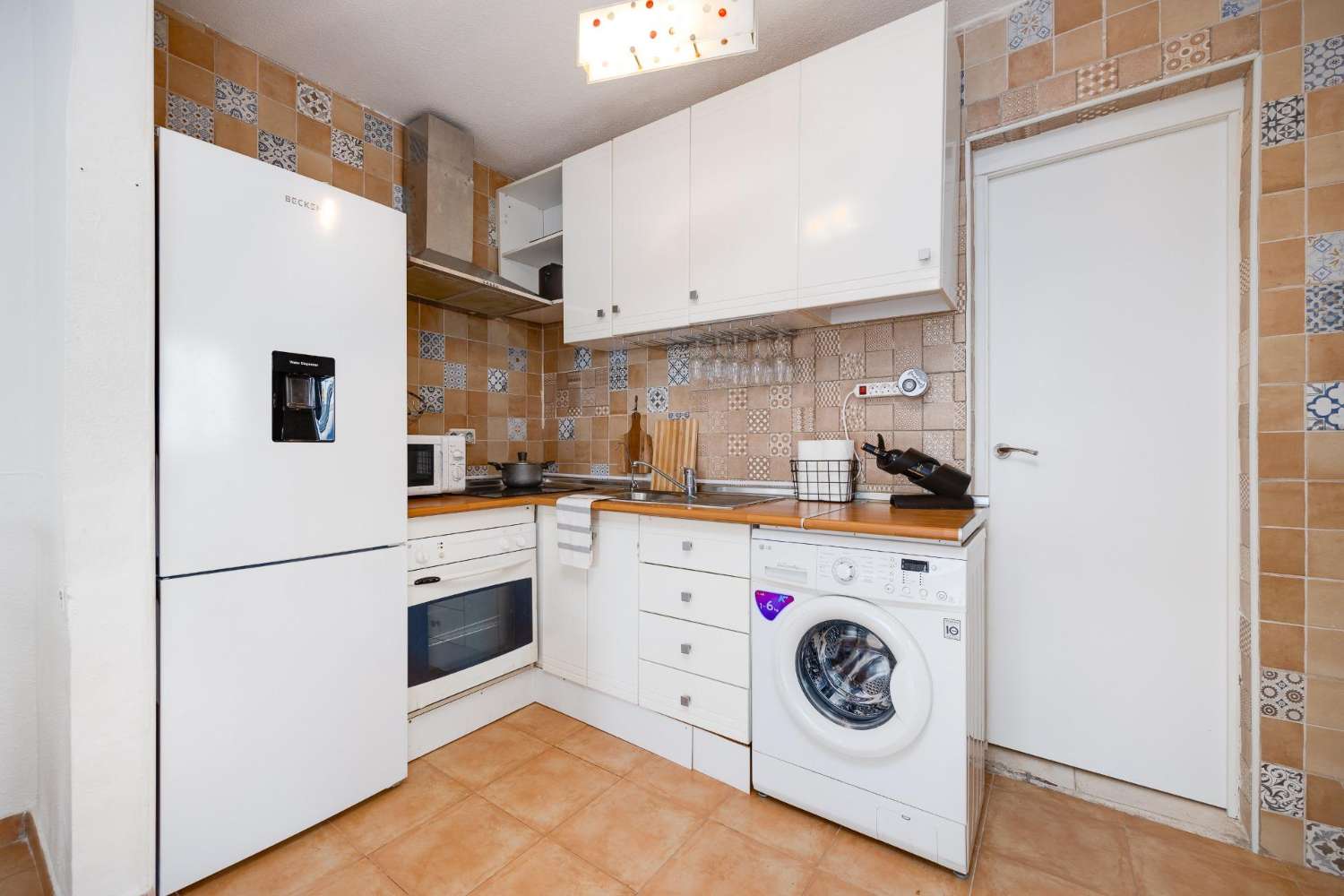 Fantastiskt radhus med 2 sovrum, privat trädgård och solarium