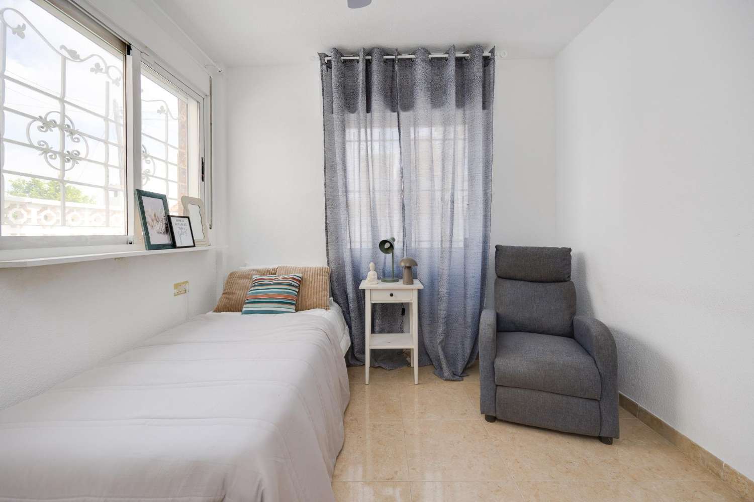 Fantastiskt radhus med 2 sovrum, privat trädgård och solarium